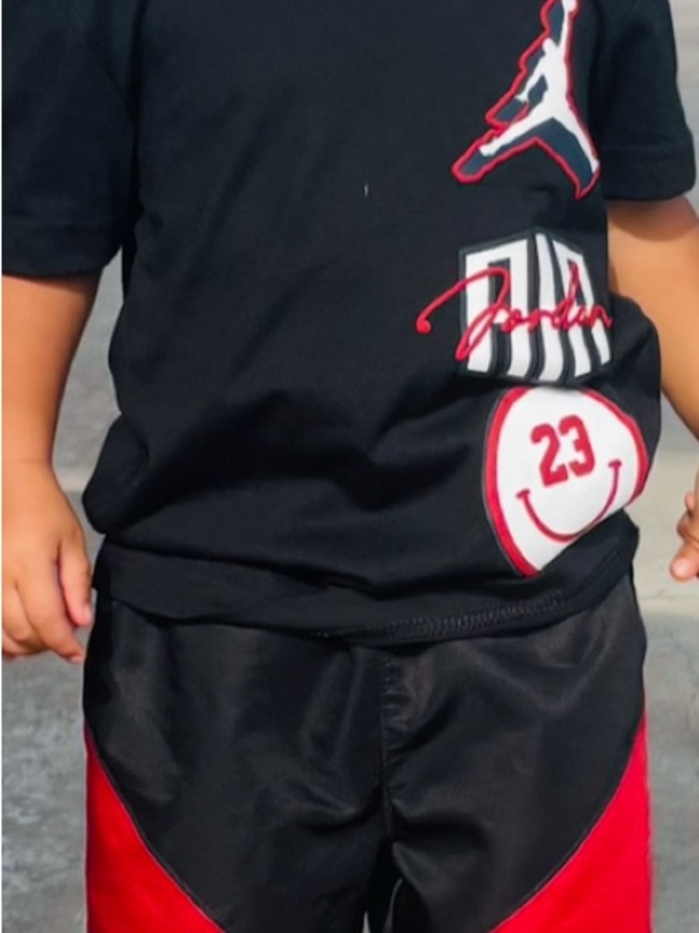 Jordan Kids Black Tee with Red & White Graphic